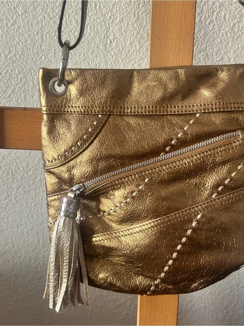 b. makowsky Metallic Gold Crossbody with Tassel Accent